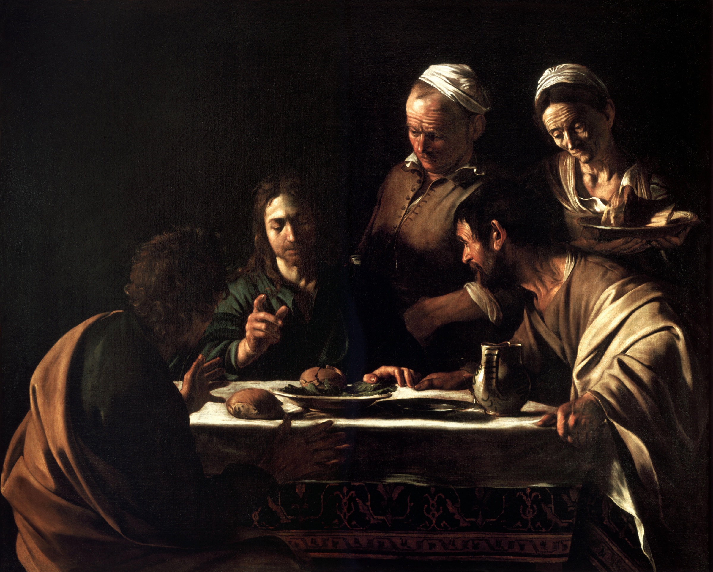 The risen Christ blessing bread at table with disciples in Caravaggio’s 1606 painting